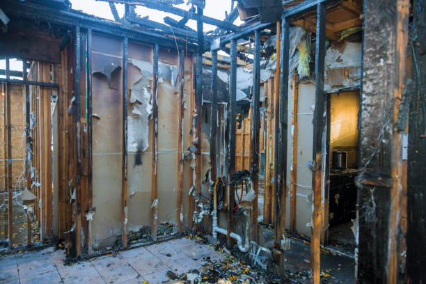 Professional Fire Damage Restoration technician working in Morrisville, VT